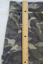 Load image into Gallery viewer, Close up picture of waistband next to a ruler to show width. 1.75 inches. Close up of fabric texture.